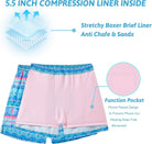 Product detail of men's 2-in-1 swim trunks showing the blue printed outer shorts and supportive contrast compression liner.