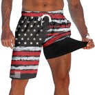 Men's American flag print 2-in-1 swim trunks with black compression liner and drawstring waist for summer beach and pool wear.
