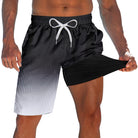 Men's black 2-in-1 swim trunks with built-in compression liner and adjustable drawstring waist for beach, pool and active summer wear.