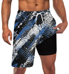 Men's black graffiti print 2-in-1 swim trunks with compression liner, drawstring waist and quick-dry design for summer wear.