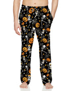 Men's black pumpkin print pajama pants with orange Halloween graphics and comfortable relaxed fit for fall lounging and sleepwear.