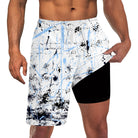 Men's black splatter print 2-in-1 swim trunks with built-in compression liner and drawstring waist for beach and pool wear.