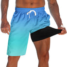 Men's blue gradient 2-in-1 swim trunks with black compression liner and drawstring waist for swimming, beach trips and summer activities.