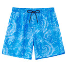 Men's blue tie dye swim trunks with lightweight fabric and breathable liner, colorful summer beach shorts.