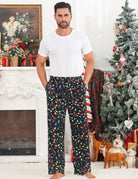 Man wearing Christmas print lounge pants during a holiday setting, showing the relaxed fit and festive homewear style.