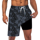 Men's dark grey leaf print 2-in-1 swim trunks with compression liner and drawstring waist for swimming and summer activities.