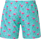 Back view of men's green flamingo swim trunks showing the all-over print, elastic waistband and relaxed outer short design.