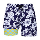 Men's navy hibiscus print swim trunks with tropical floral design and built-in compression liner for beach and vacation wear.