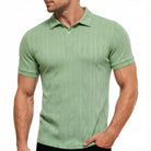 Men's green textured knit polo shirt featuring short sleeves, classic collar and subtle texture for versatile casual styling.
