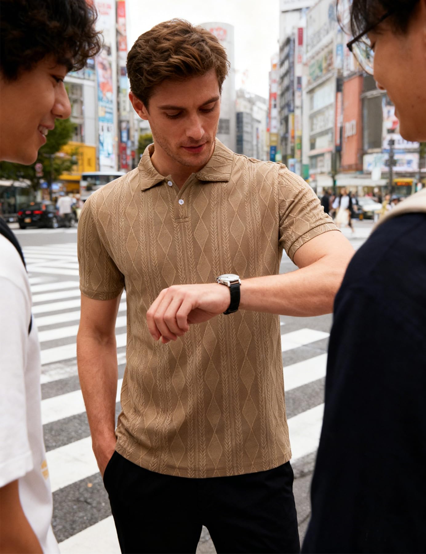Man wearing a khaki textured knit polo shirt while checking his watch, styled for a clean and versatile smart casual look.