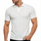 Men's white textured knit polo shirt with classic collar, short sleeves and clean solid-color design for smart casual everyday wear.