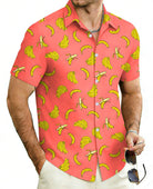 Men's orange tropical shirt with banana print for summer resort wear.