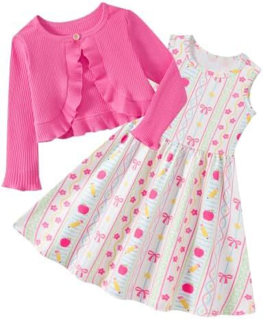 Girls pink dress with bow stripe pattern and matching cardigan creating a cute everyday layered outfit.