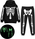 Kids black skeleton costume set with hooded top and matching pants featuring glow in the dark bone print for Halloween dress up.