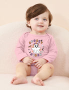 Toddler wearing a pink Halloween ghost graphic long sleeve bodysuit indoors, showing the comfortable fit for parties, photos and fall wear.