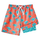 pink tropical print swim trunks for boys beach vacation outfits
