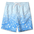 Boys blue gradient swim trunks with built-in liner and drawstring waist, stylish swim shorts for kids.